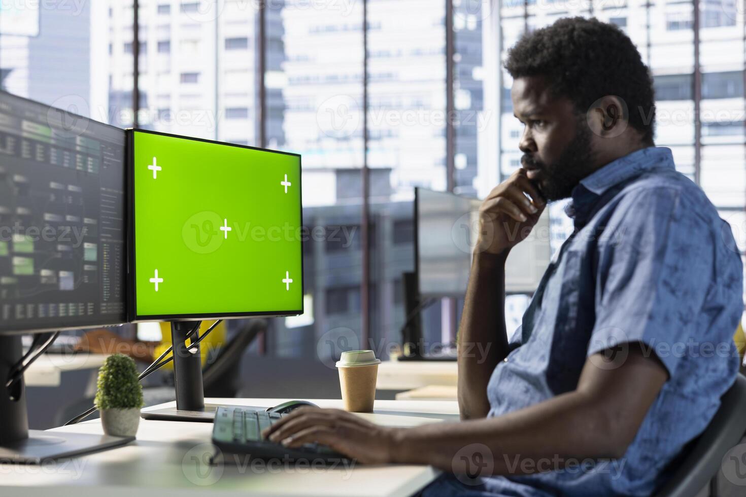 Programmer conducting tests on isolated screen computer to optimize machine learning models for performance and accuracy. IT specialist in office analyzing complex AI data on chroma key PC photo