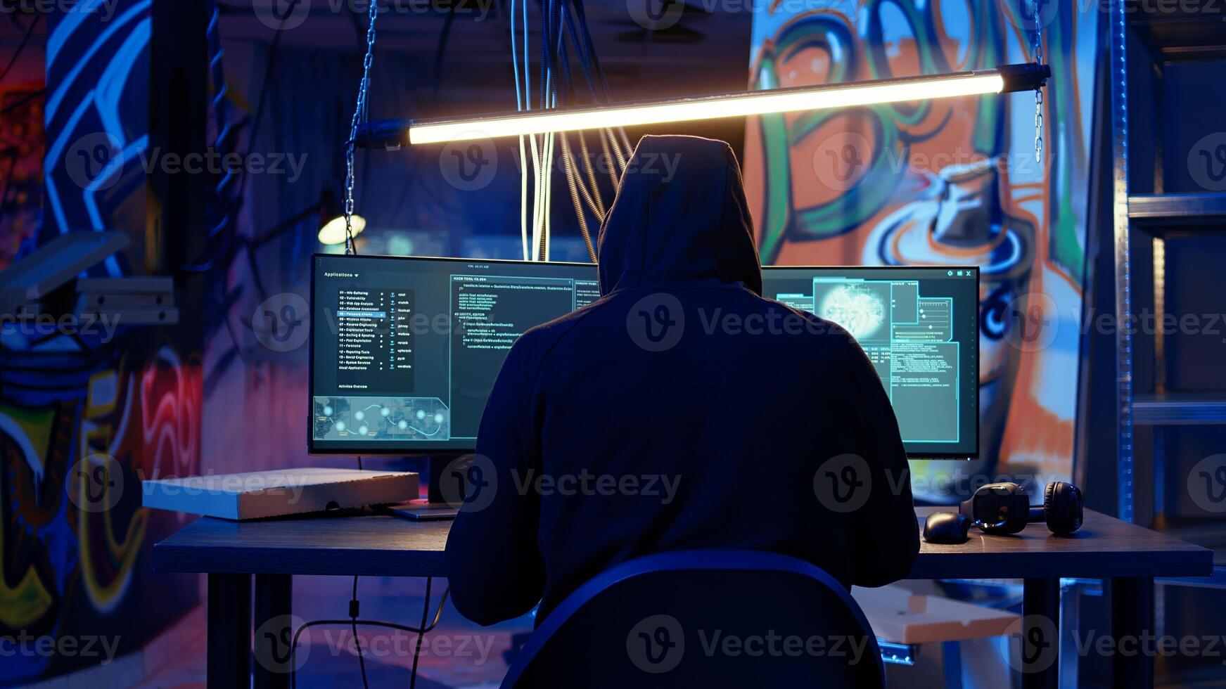 Hacker devising plan, coding malware designed to exploit network backdoors, bypassing security measures such as logins and password protections in graffiti painted bunker, dolly in shot photo