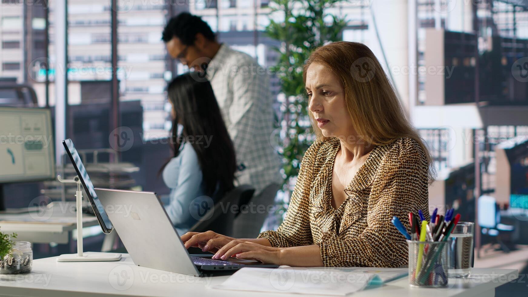 Entrepreneur feels emotional strain and frustration of business failure, disappointment and challenges. Mental exhaustion as she struggles to find solutions for professional struggle. Camera A. photo
