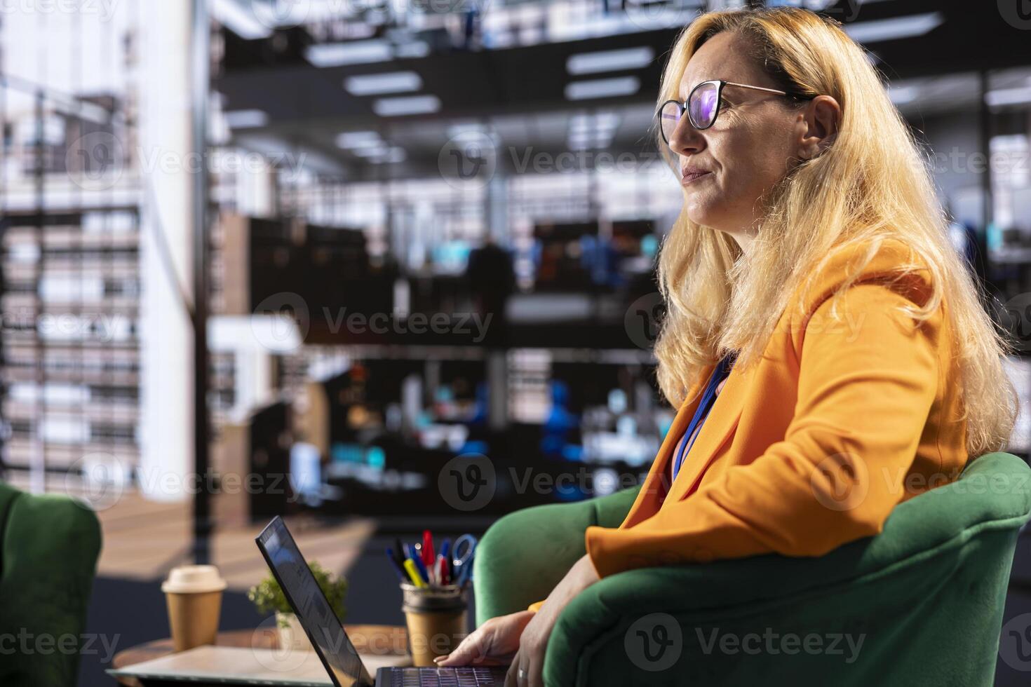 General director reviewing data analytics with her team for successful development plan, working hard to expand the business globally. Female CEO showing great leadership skills, briefing meeting. photo