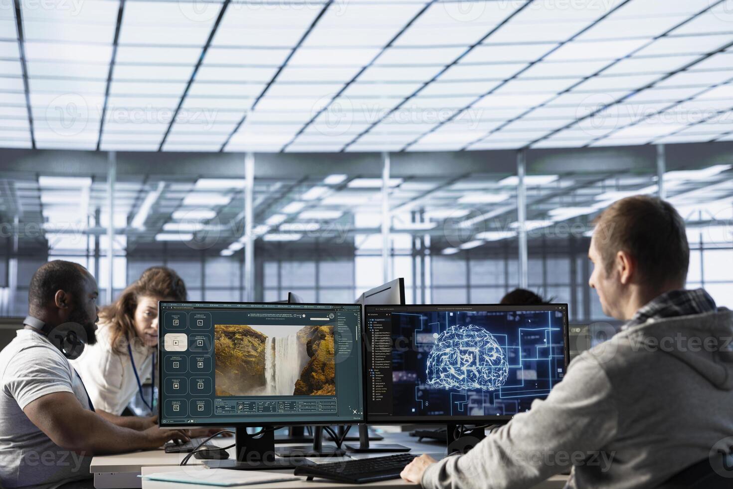 Team of programmers in server room making generative artificial intelligence website generating videos using diffusion models. Teamworking colleagues coding AI virtual assistant producing clips photo