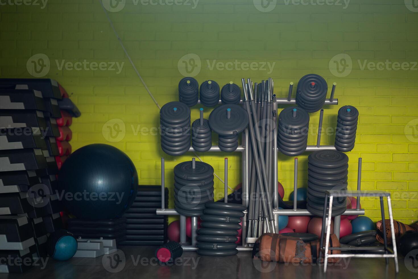 A pair of dumbbells neatly arranged in the gym, ready for a powerful workout session to build strength and endurance photo