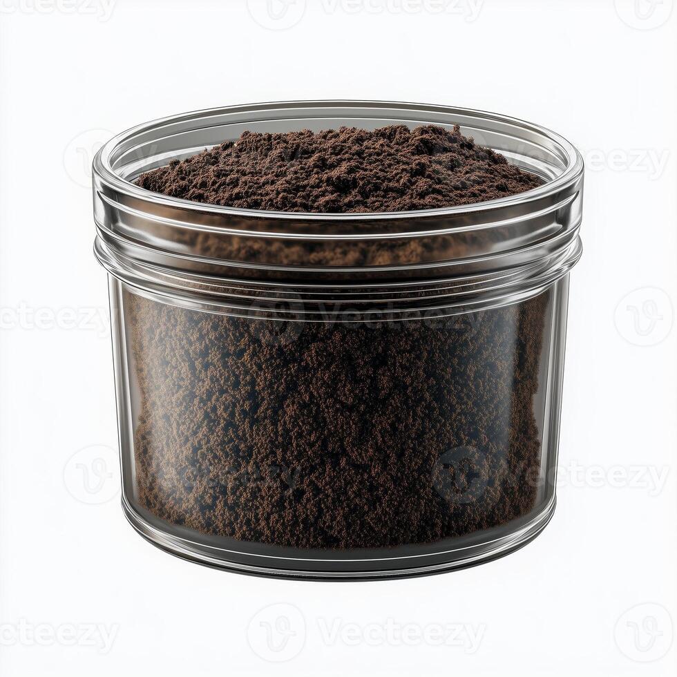 Glass container of coffee grounds, on a white background. 7 photo