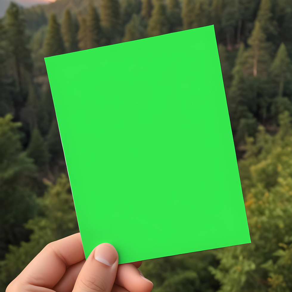 mockup of card being held in hand forest background psd