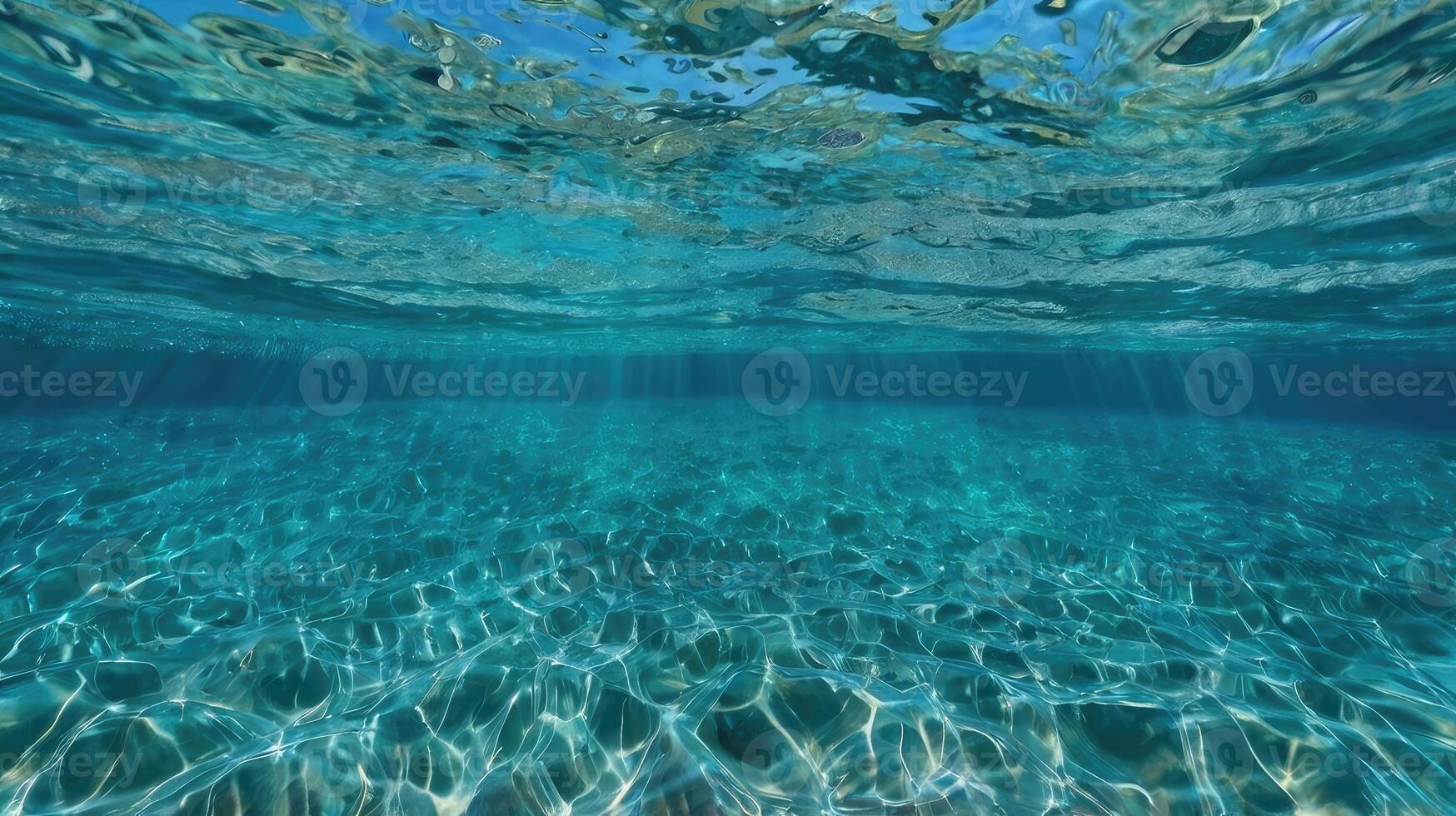 the background of clear sea water shows the surface photo