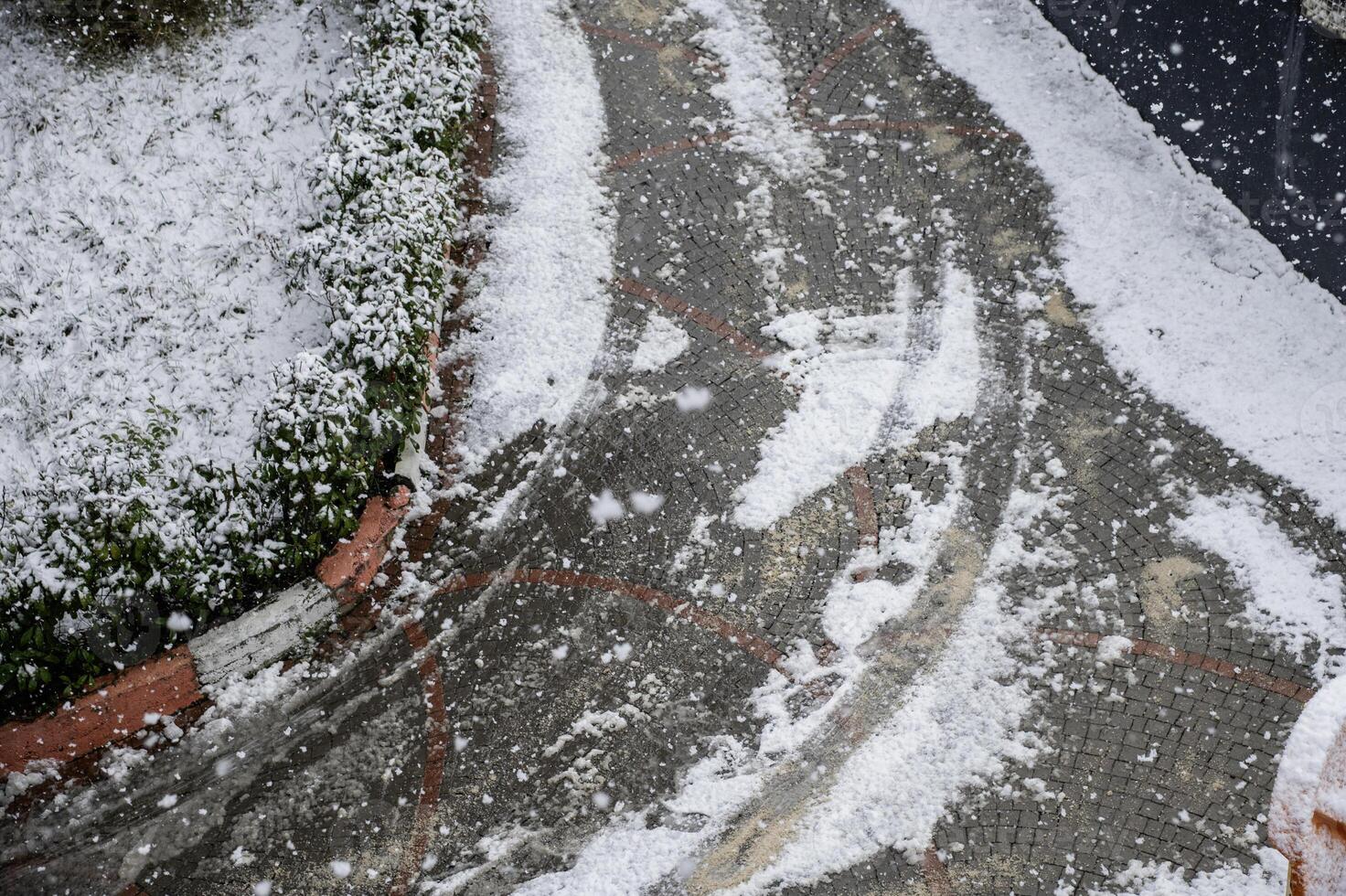 The entrace and exit way of the garage were covered with snow.frost and ice season. photo