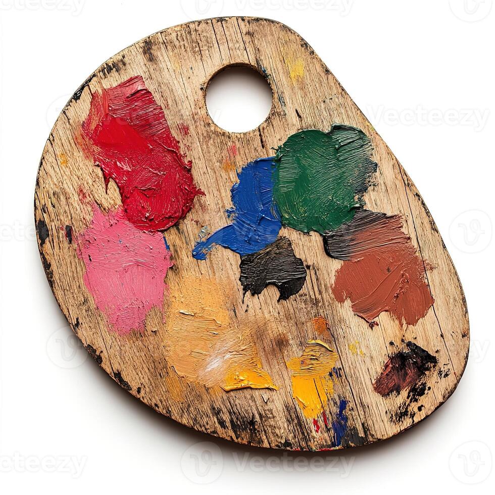 wooden artists palette with multicolored paint strokes isolated on white background photo