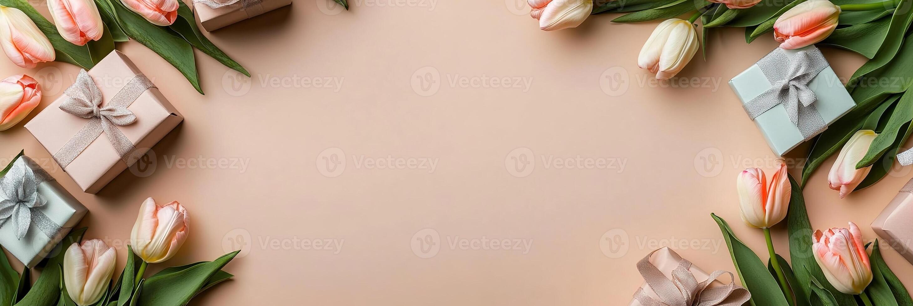 floral composition banner with tulips flowers border frame with small gift boxes on light pink background top view template with copy space photo