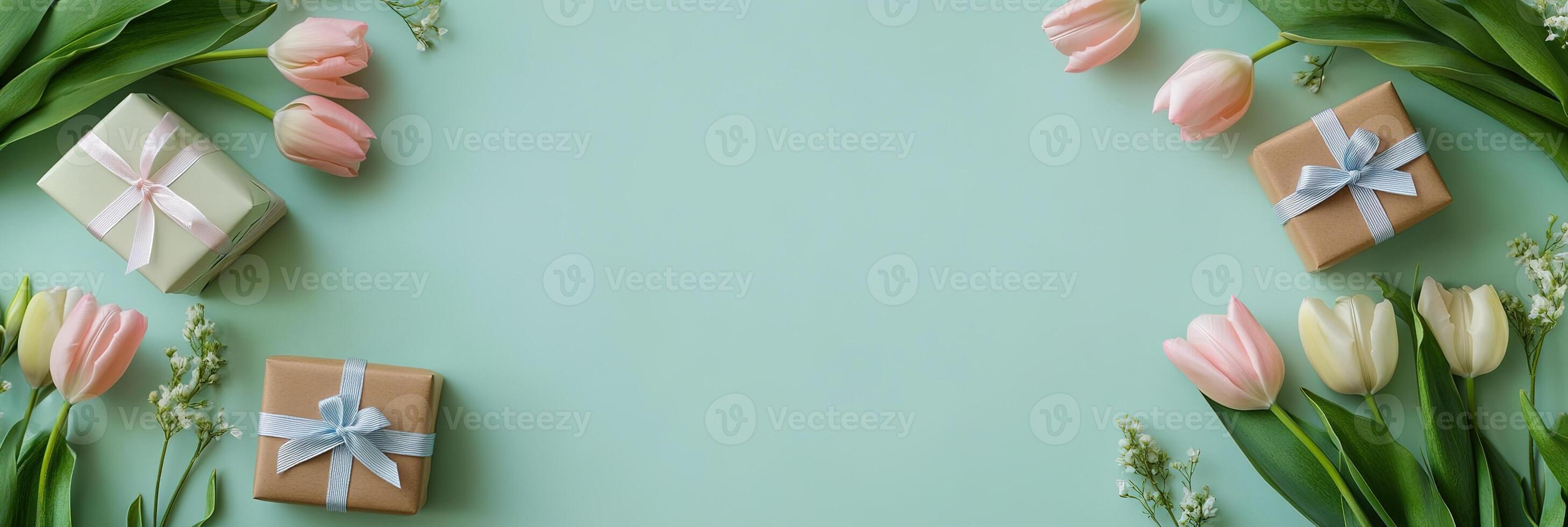 floral composition banner with tulips flowers border frame with small gift boxes on light green background top view template with copy space photo