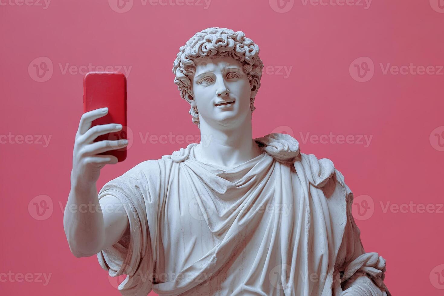 young roman antique male marble sculpture taking selfie on red smartphone on pink background photo