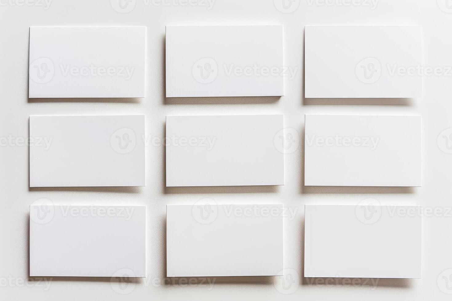 Nine blank business cards are displayed in a grid format on a white background, offering a clean, professional canvas for personalized designs and contact information photo