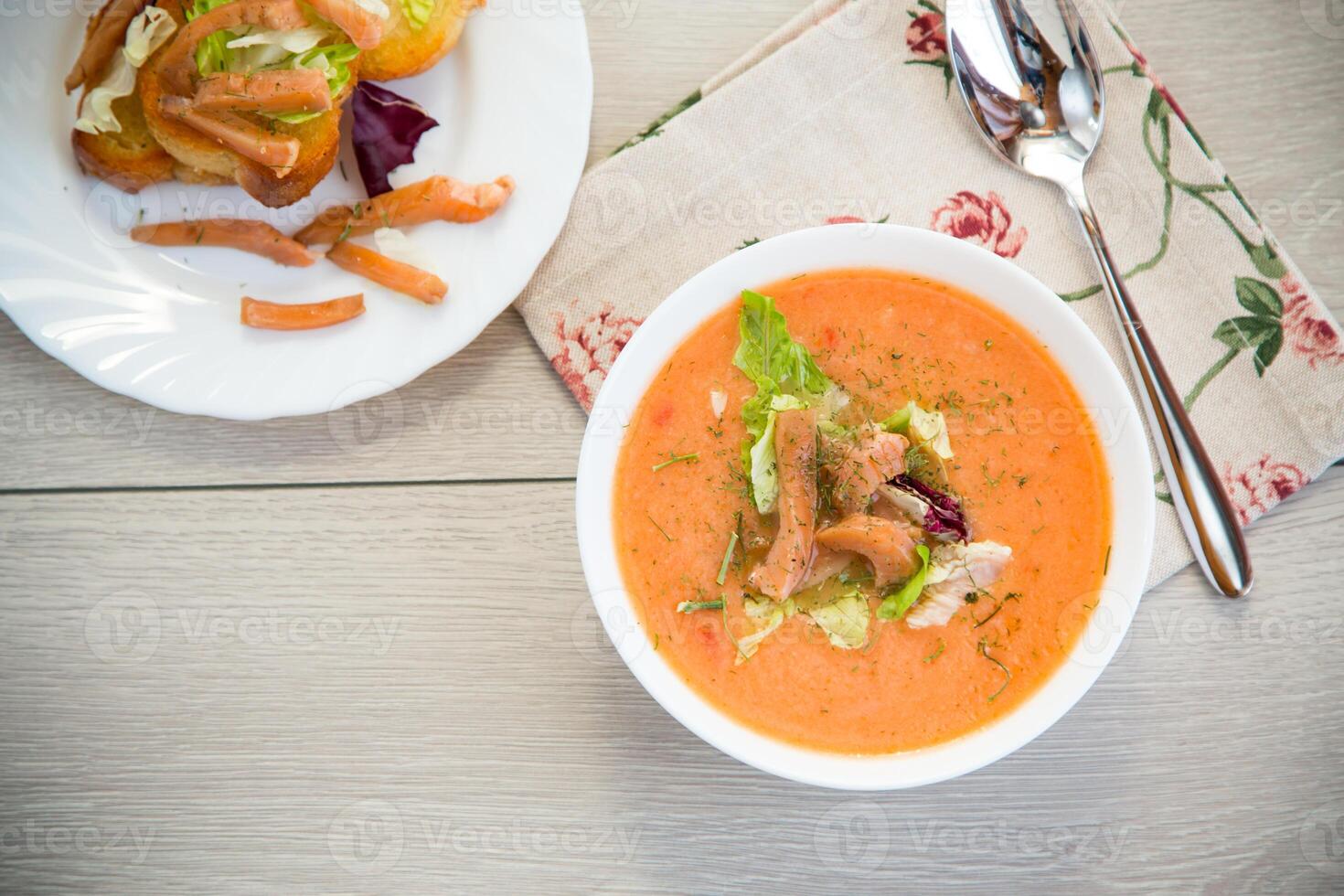 It's time for lunch.Hot fish soup-puree with vegetables and cream for gourmets photo