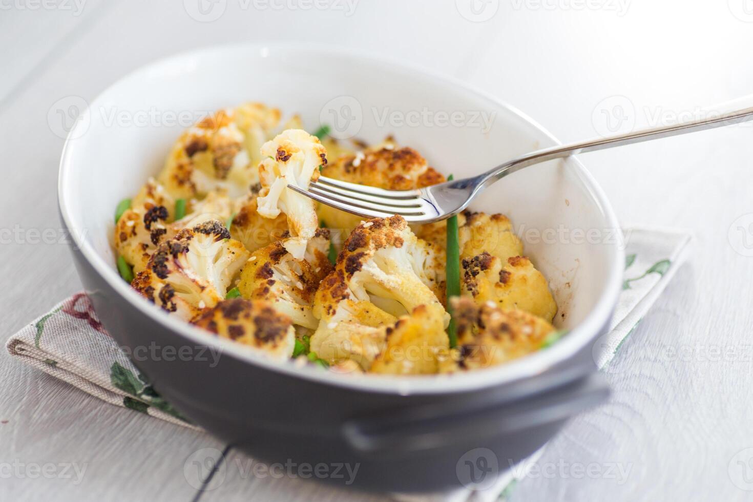 Vegetables for dinner. Healthy Vegetable Dish of Cauliflower photo