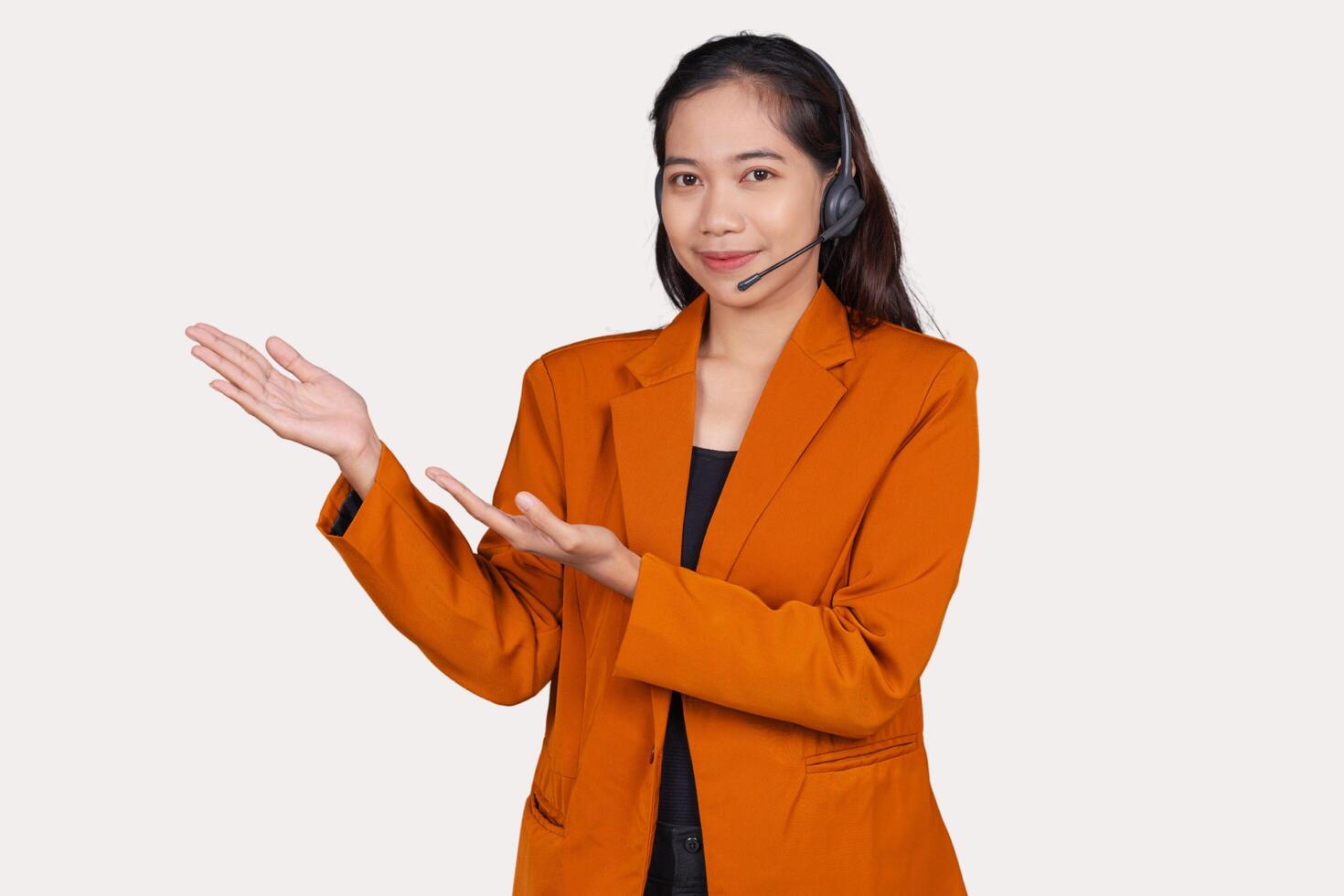 Young Woman Customer Service Representative Agent Presenting or Explaining Isolated On White Background photo