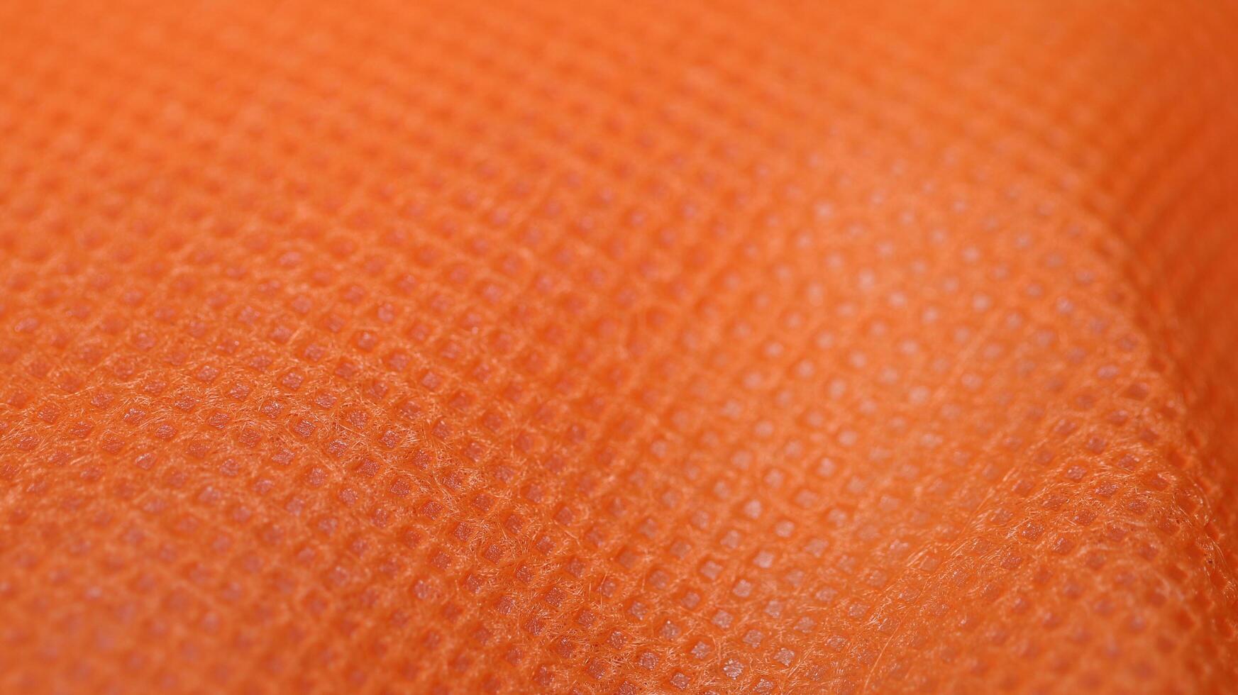 Detailed Texture View of Orange Textile photo