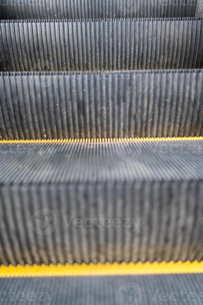 Escalator yellow steel line. photo