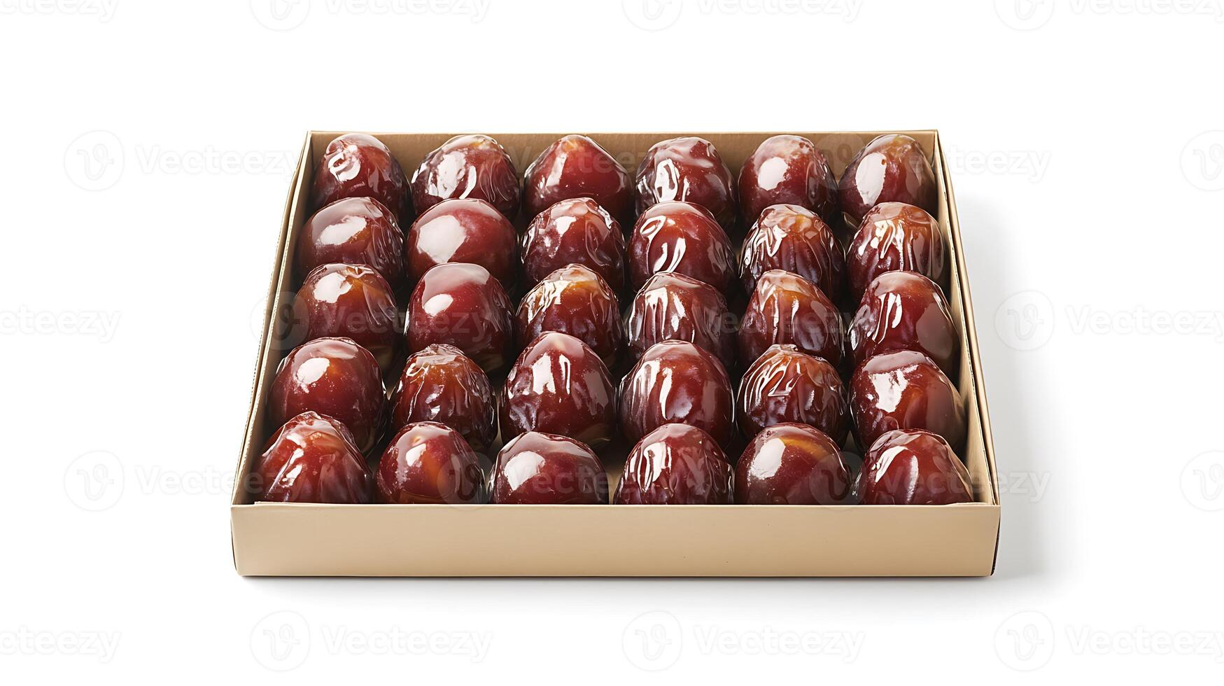A box of dates sitting on a white surface photo