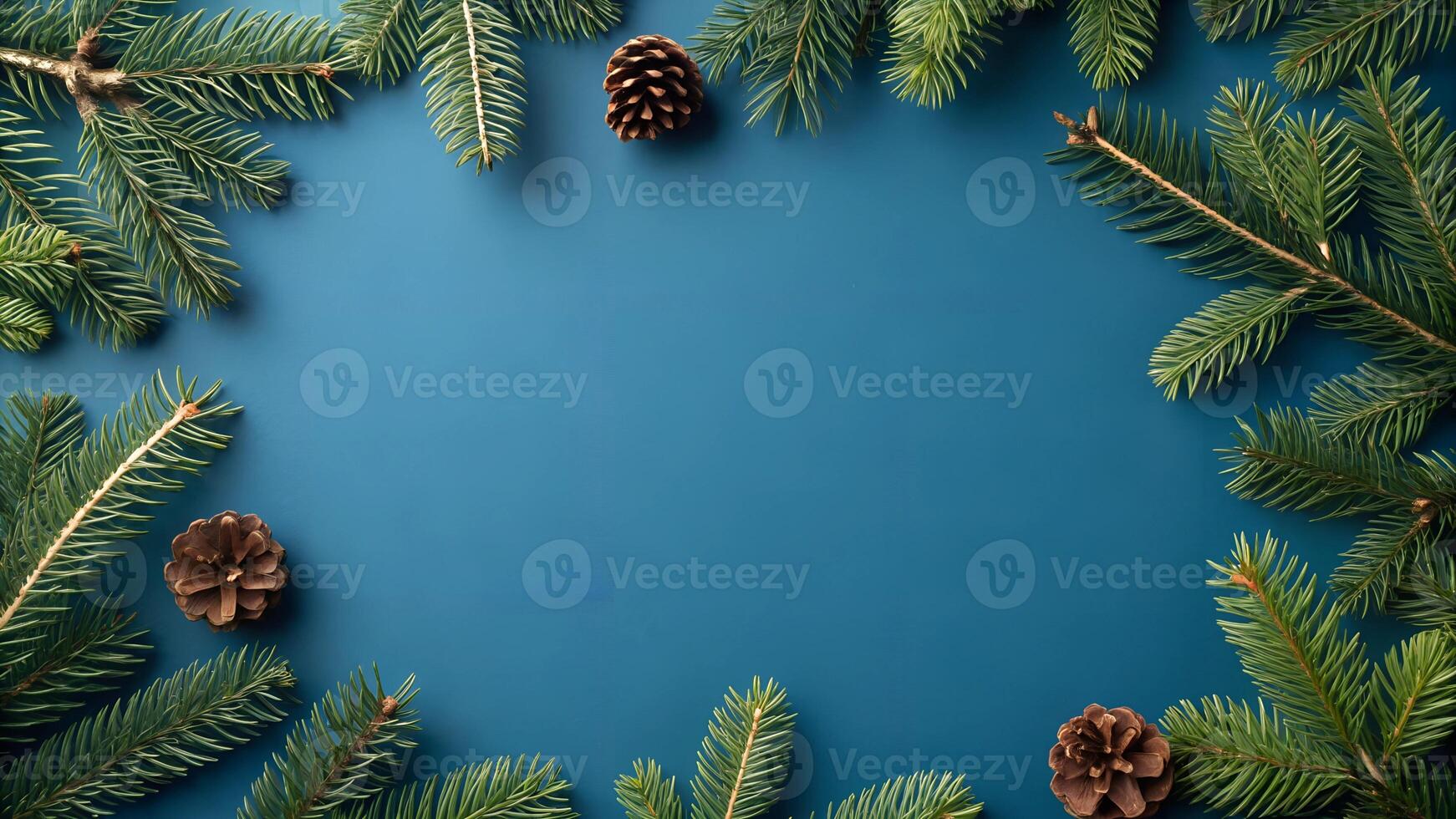 Blue Holiday Background with Pine Branches and Pinecones photo