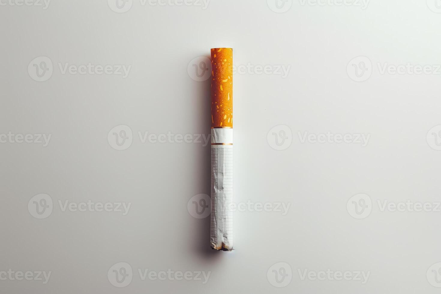 A cigarette is on a white background. photo