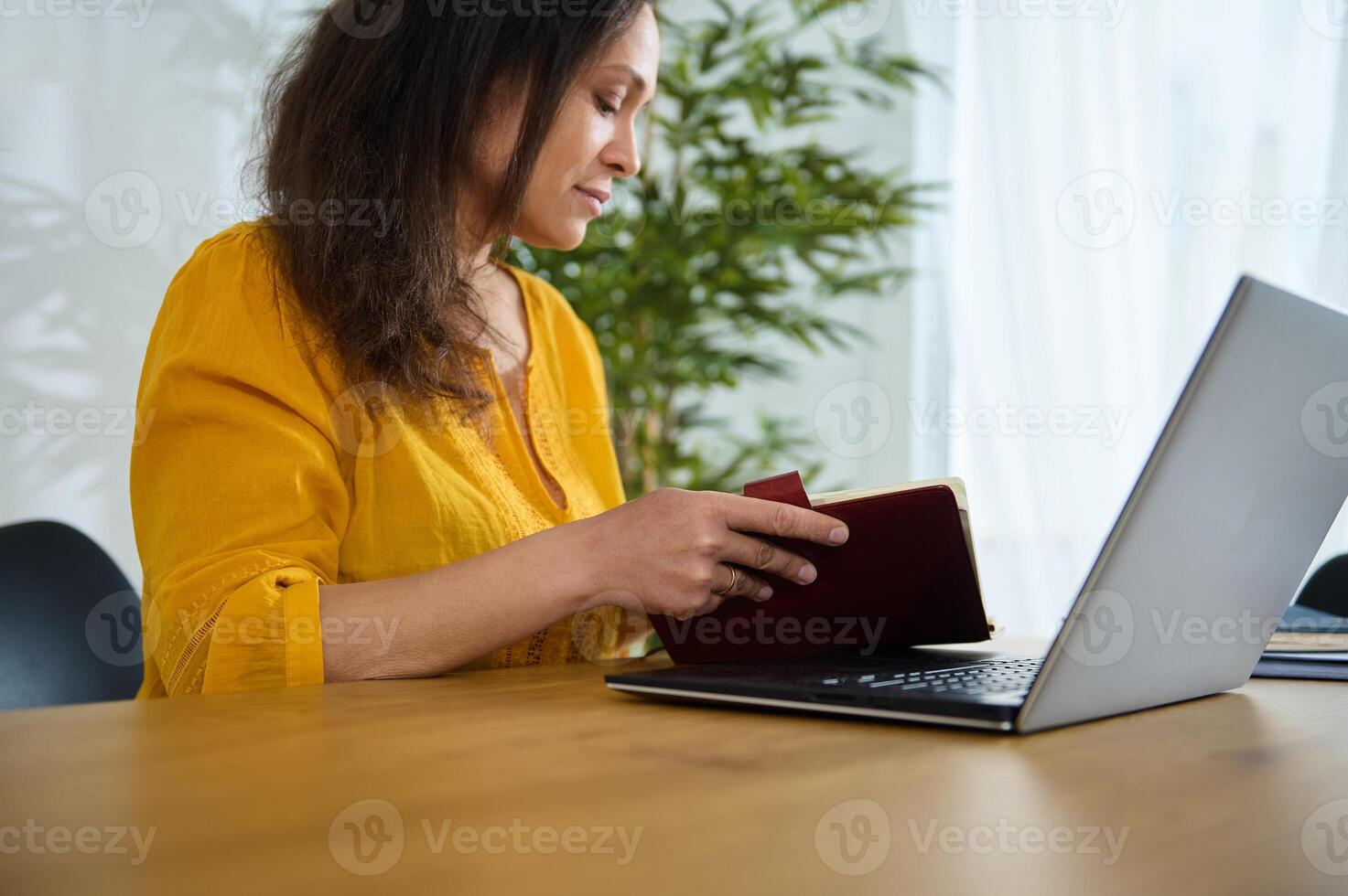 Confident Businesswoman Working Remotely From Cozy Home Office Environment photo