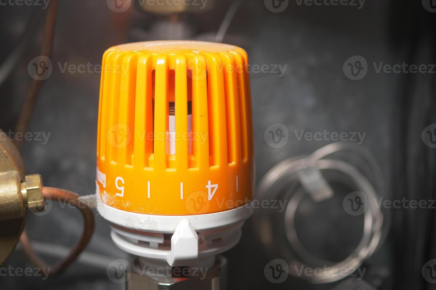 Safety alarm system with a bright orange warning light indoors photo