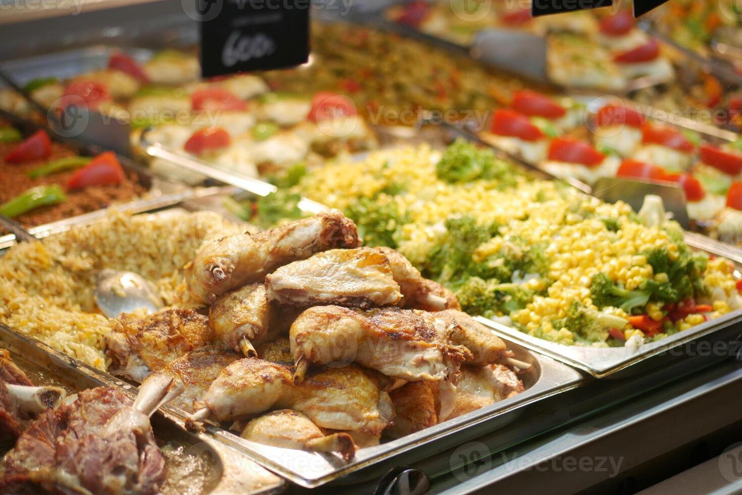 Colorful buffet display with various dishes in a dining area photo