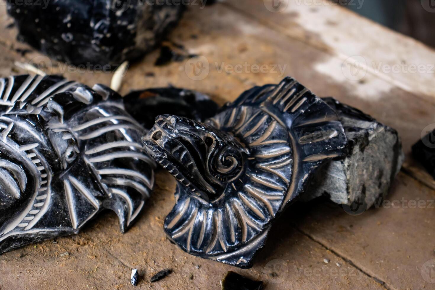 Obsidian crafts. Elaboration of obsidian crafts at the Teotihuacan archaeological site. photo