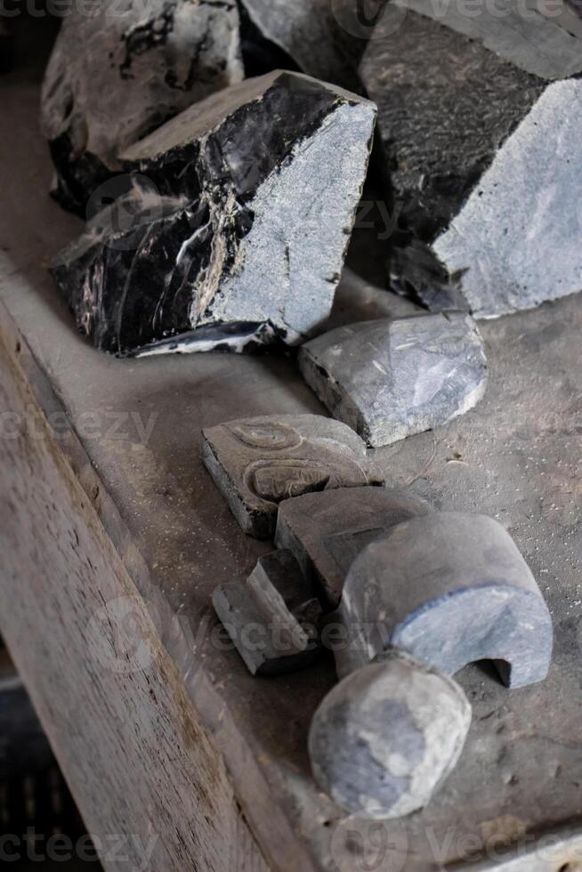 Elaboration of obsidian crafts at the Teotihuacan archaeological site. Vertical image. photo