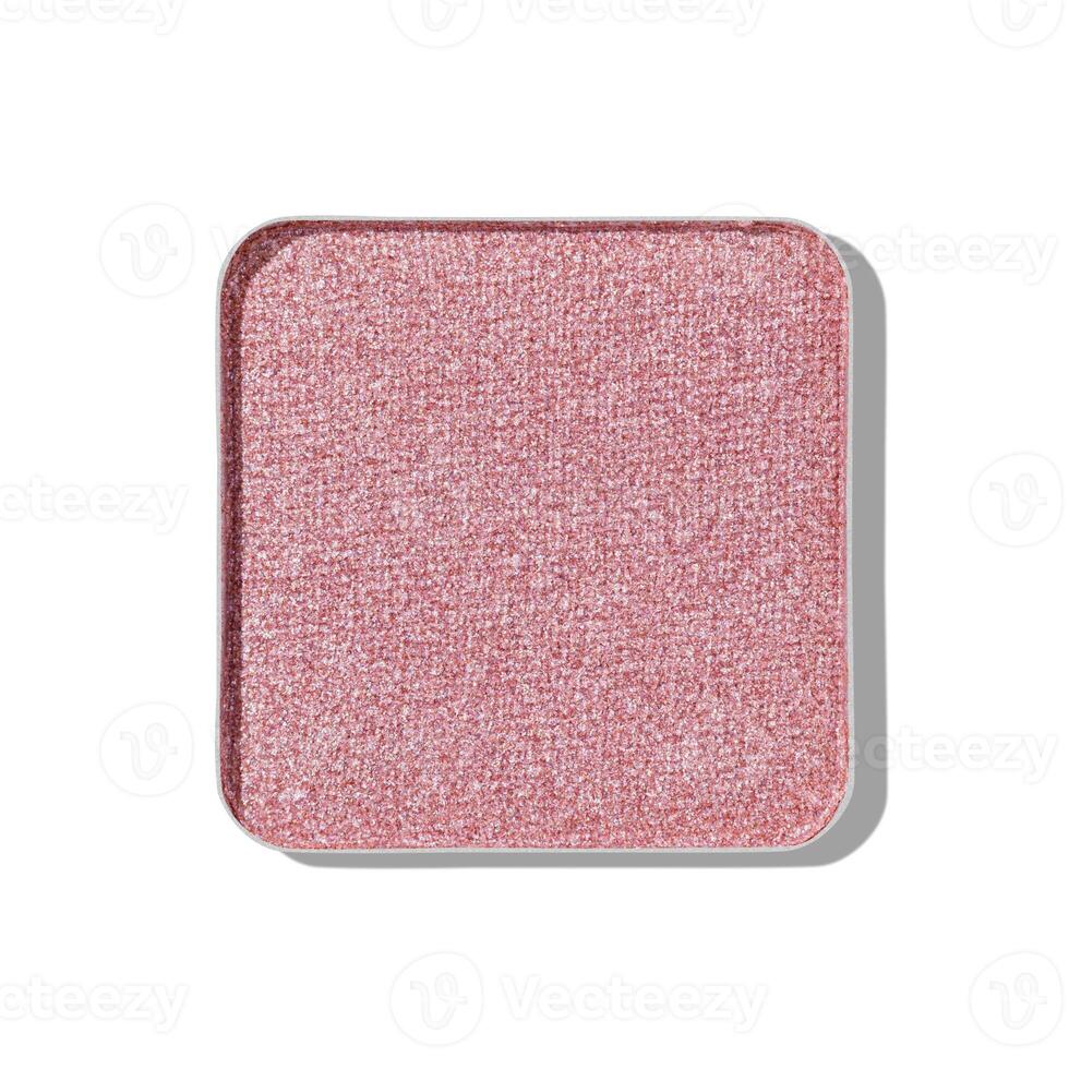 Top view eye shadow glitter beige pink swatch, object isolated on white background with shadow, sparkling eyeshadow, shiny colored powder for festive makeup, square shape metal pack, beauty photo