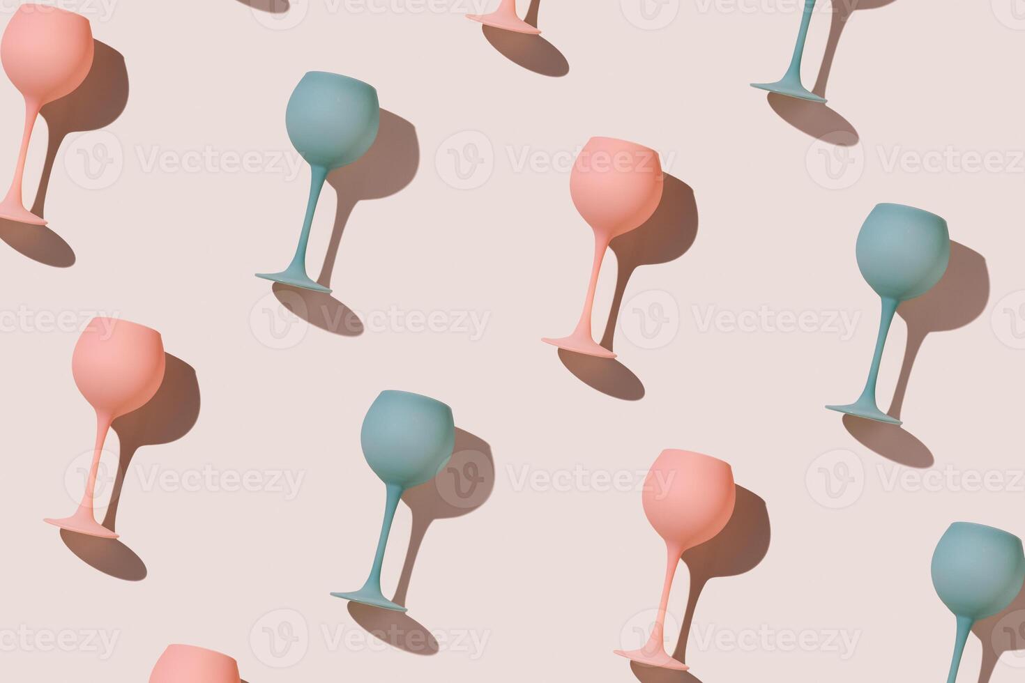 Minimal trend pattern from pink and blue colored wine glasses on beige background, geometric stylish layout of goblets. Entertainment, event, summer party concept. Abstract alcohol drinks photo