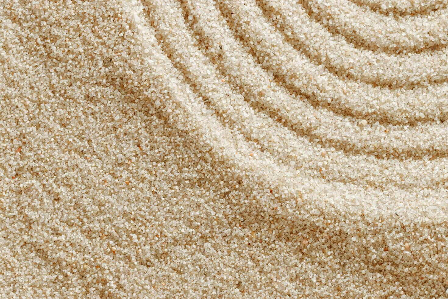 Aesthetic minimal natural sandy background with sandy waves and ripples, light and shadows. Pastel colored zen garden fon for Spa, meditation, relaxation, wellness. Style design concept, copyspace photo