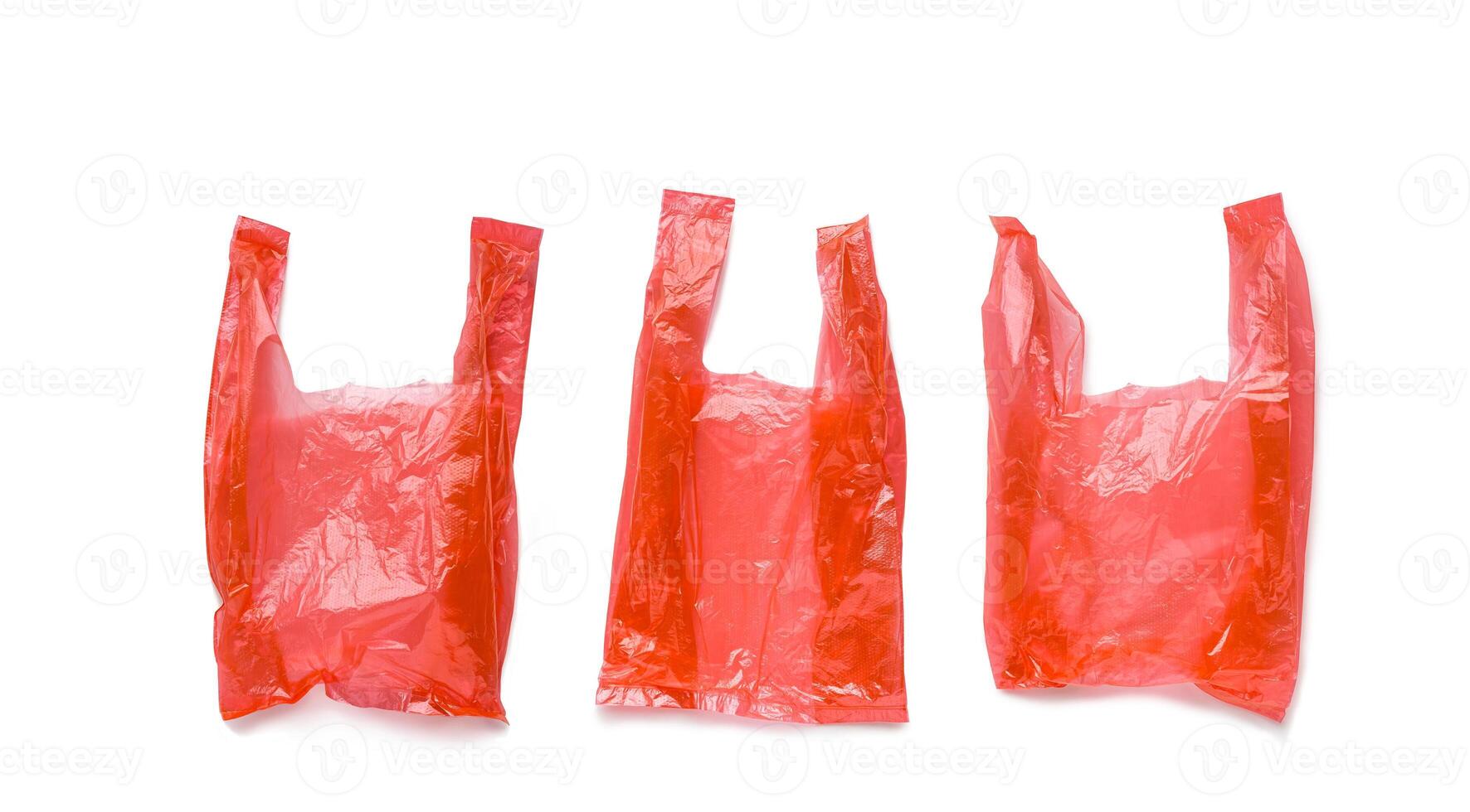Set of Close up Red plastic bags isolated on white background, cut out object, design element. Single-use polythene packet, Biodegradable packaging waste, Disposable bag, bag free day photo