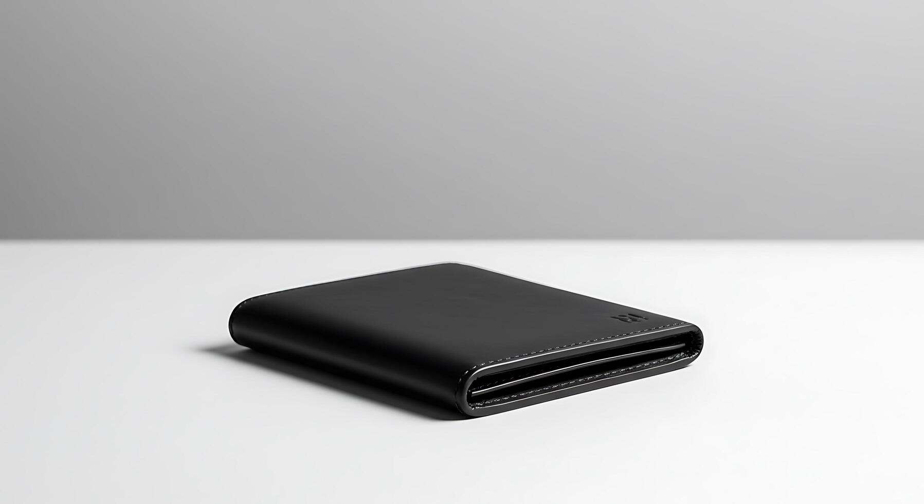 Sleek and Minimalist Black Leather Wallet for Modern Men photo
