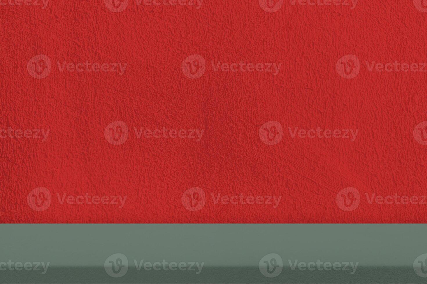 Green Floor with Red Concrete Wall Background. photo