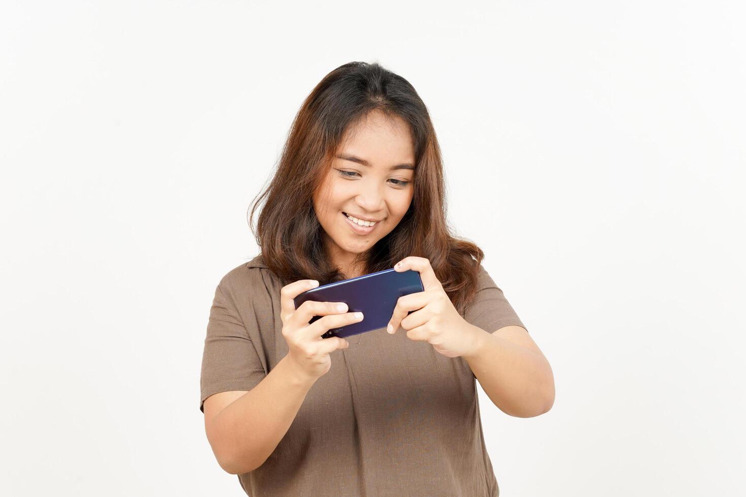 Asian woman using smartphone on white background photo