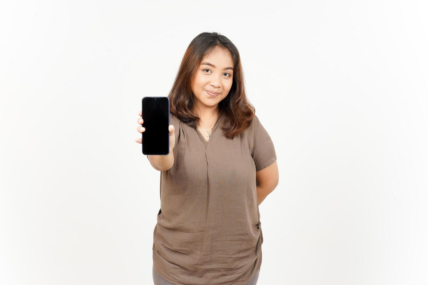 Asian woman holding up a phone with a blank screen photo