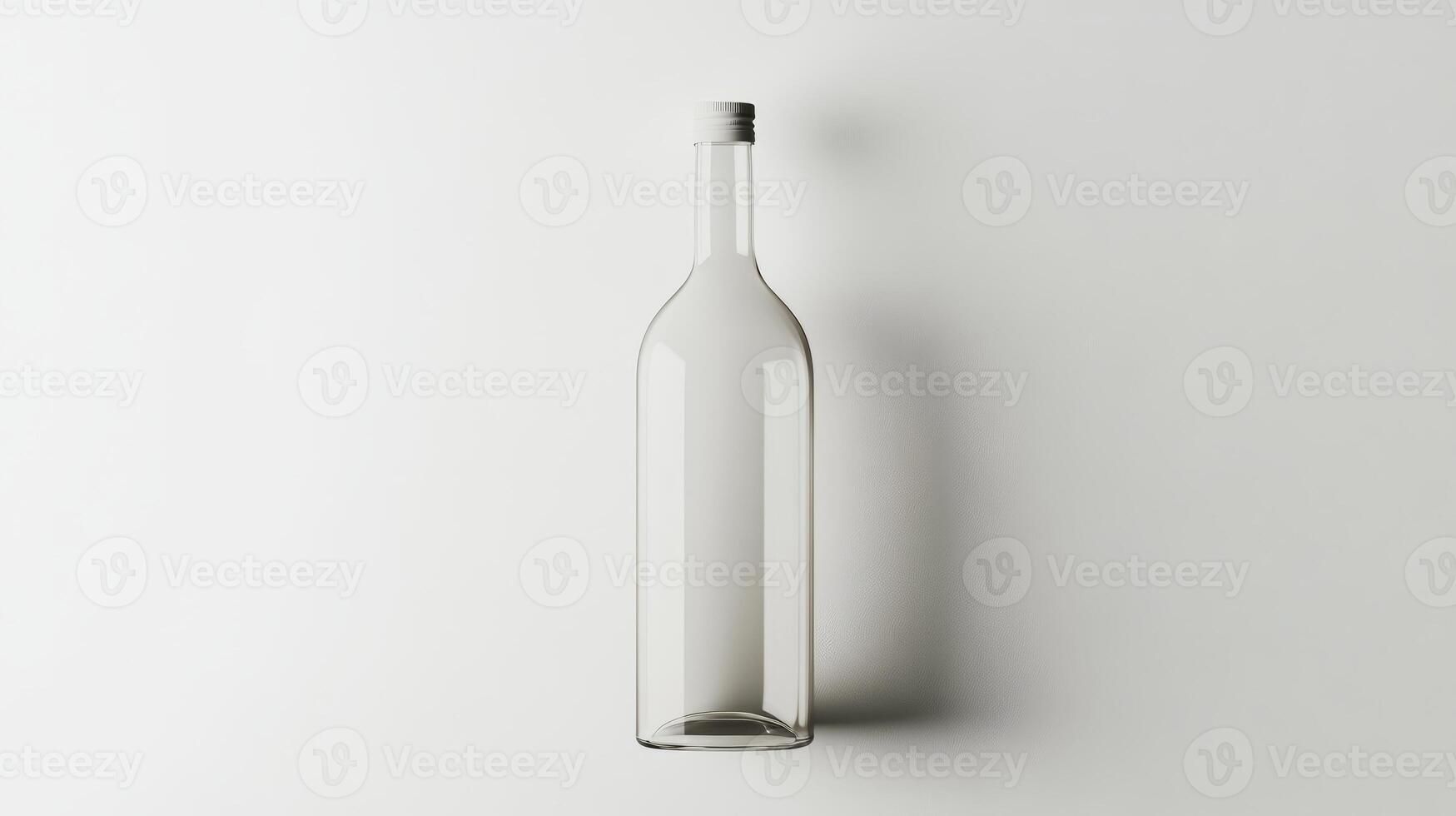 A clear glass bottle on a white background, perfect for minimalist design and branding projects. photo