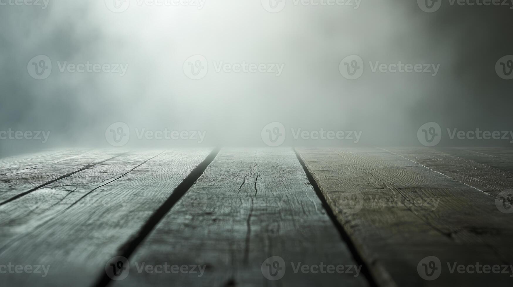 A wooden table with a foggy background. The table is empty photo