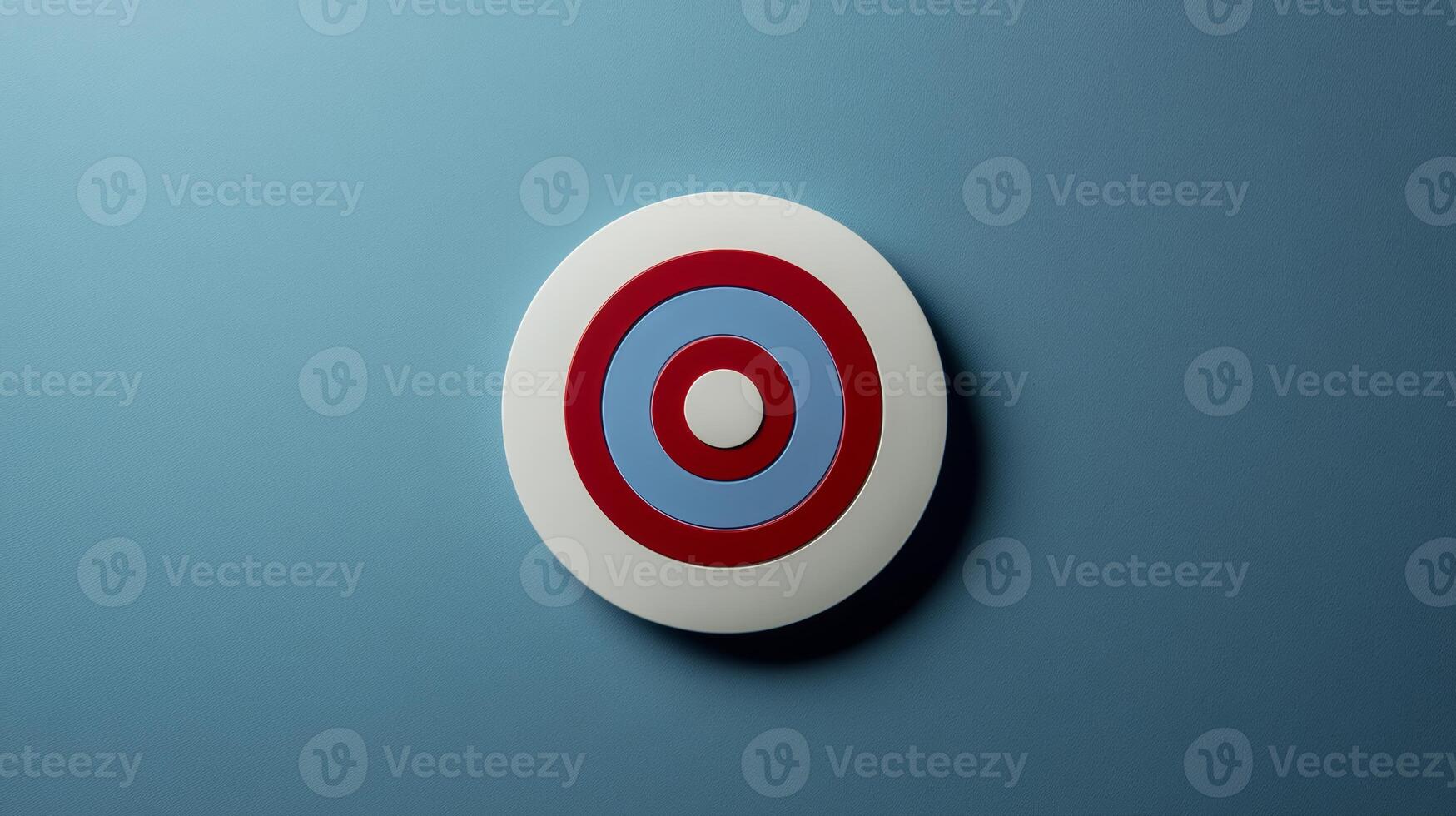 A white and red target with blue circles in the middle. The image is of a round object with a red and blue circle in the middle photo
