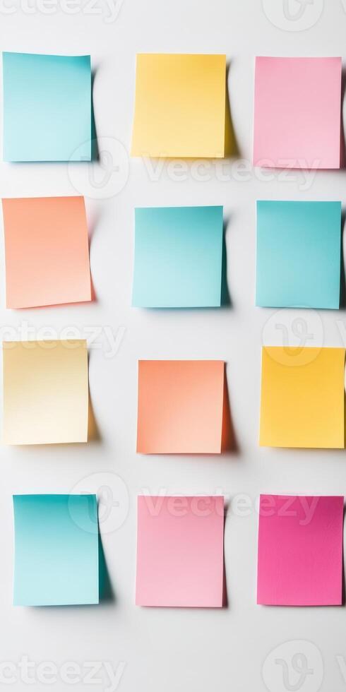 Vibrant sticky notes in a grid layout on a white surface, ideal for themes of organization, planning, and creativity. photo