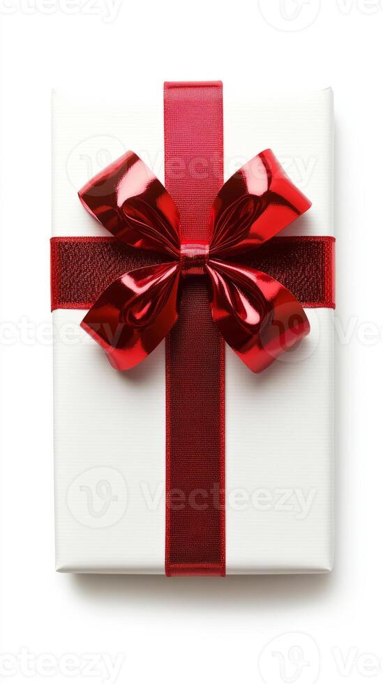 White box with a red bow on it. The bow is shiny and metallic photo