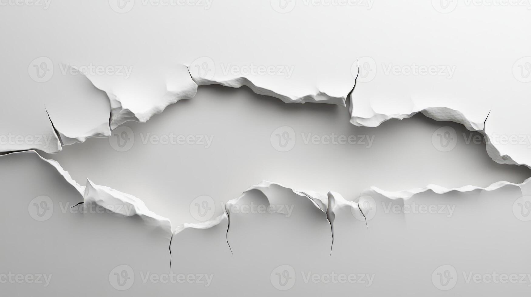 Torn Paper Hole on White Background with Jagged Edges and Shadow Creating a 3D Effect photo