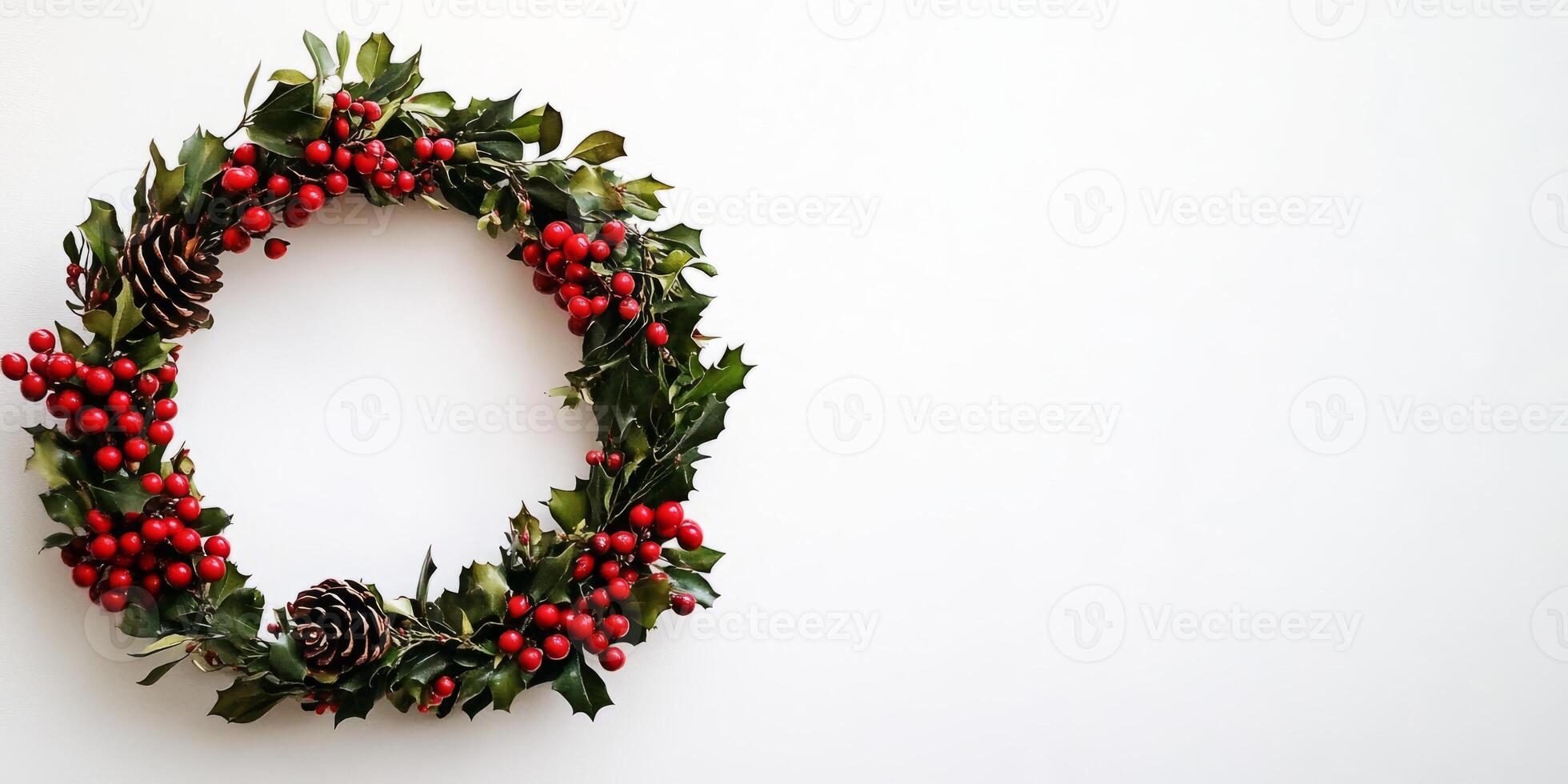 Wreath of red berries and pine cones is displayed on a white background photo