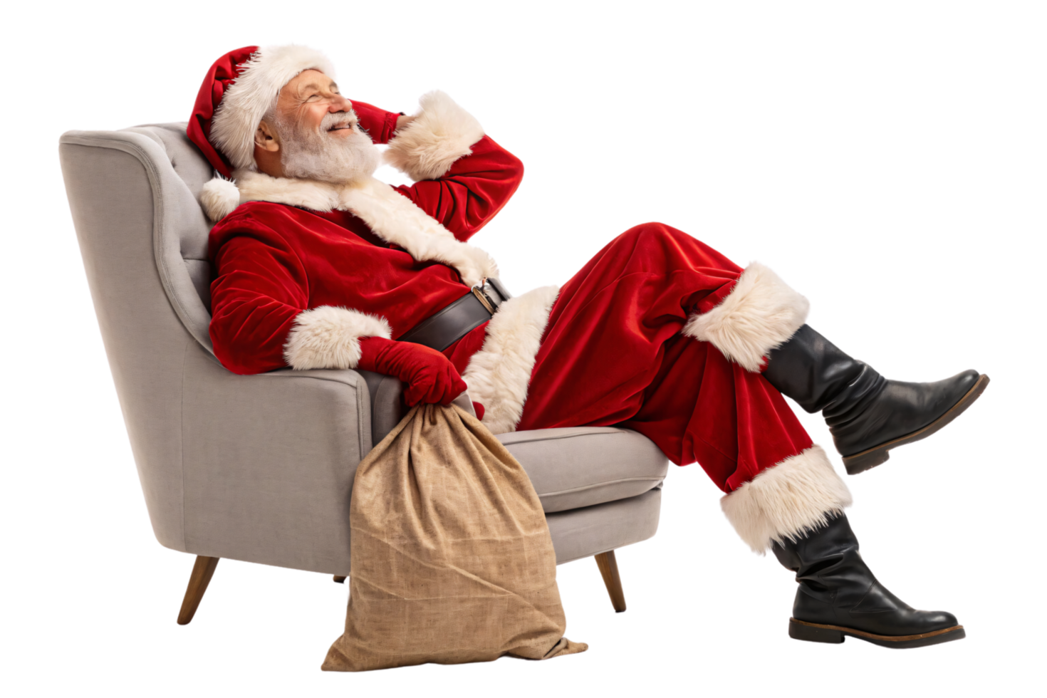 Santa Claus in a plush red suit relaxes in a modern gray armchair, holding a burlap sack, exuding festive cheer and serenity png