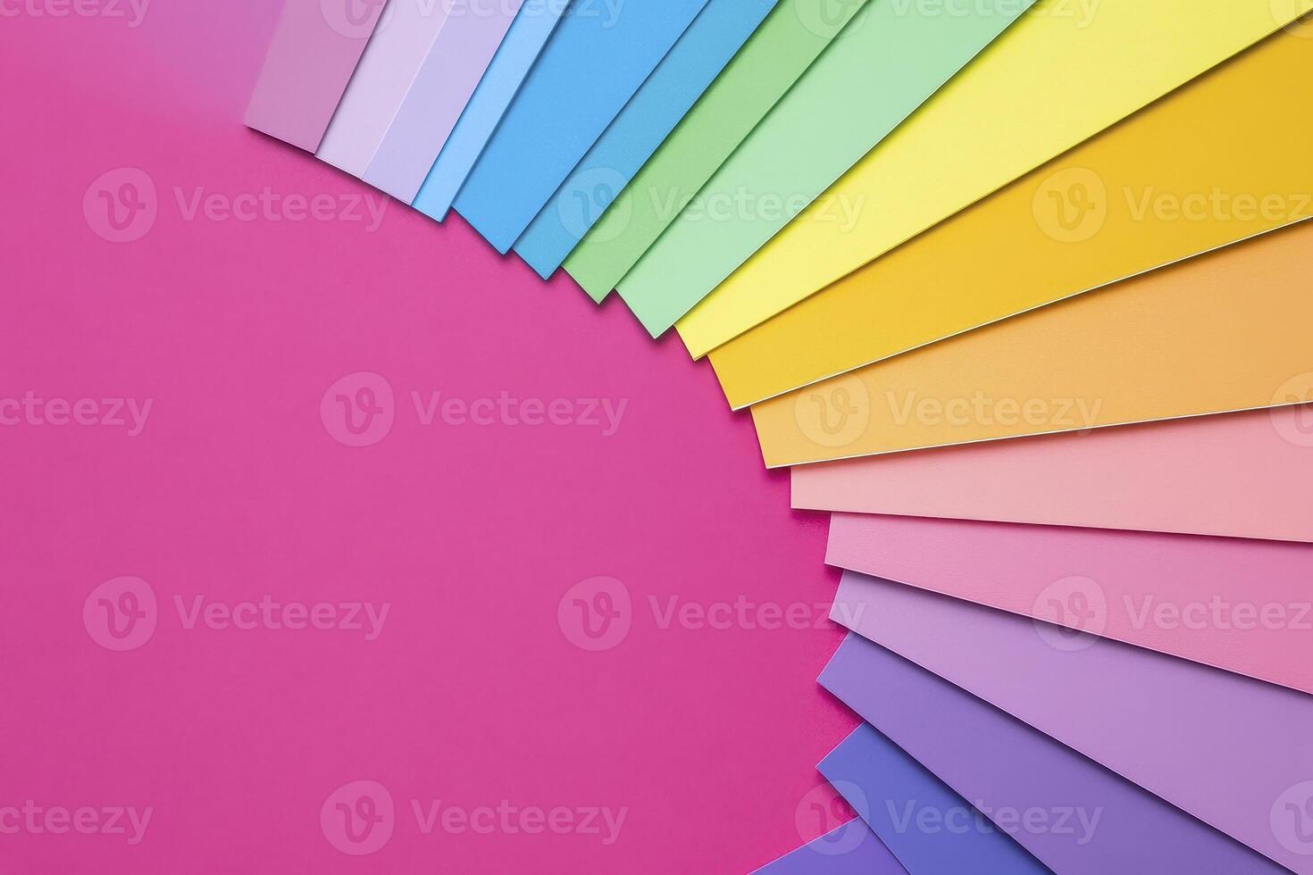 Explore a vibrant spectrum of colors with this captivating image showcasing a beautiful arrangement of pastel paper sheets Perfect for designers, artists, and anyone seeking visual inspiration This photo