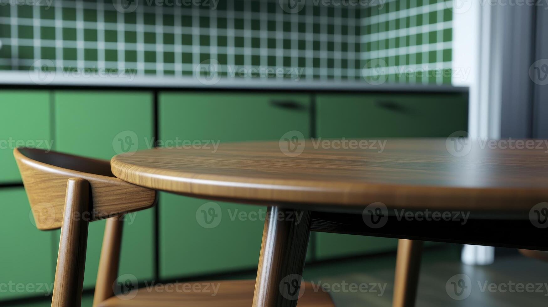 Explore a vibrant kitchen interior featuring a wooden dining table and chair set against a backdrop of sleek green cabinets and a distinctive green tiled wall, offering a modern yet warm aesthetic photo