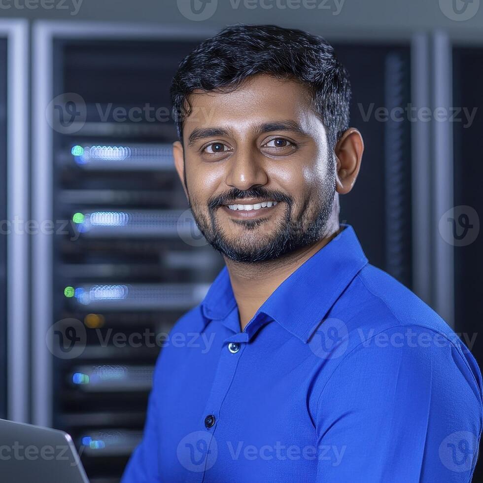 Friendly IT Professional Portrait Discover a confident young professional man in a modern technology setting, radiating positivity and competence This photograph captures the essence of expertise and photo