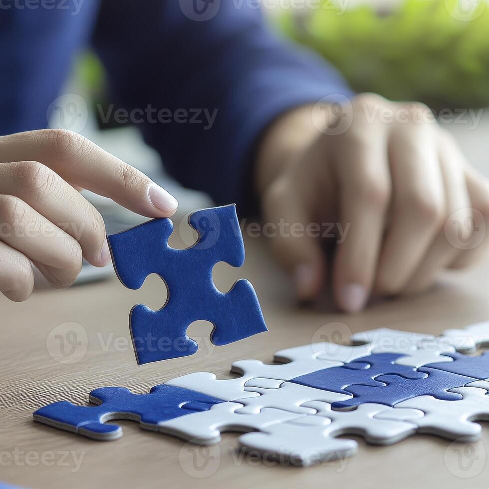 Solving a Puzzle Exploring Problem Solving, Strategy, and Teamwork with a Jigsaw Puzzle Piece Discover the Benefits of Puzzle Games and Enhance Your Cognitive Skills with Engaging Activities photo