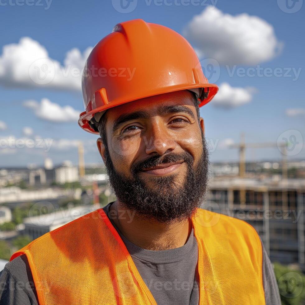 Smiling Construction Worker in Orange Hard Hat and Vest photo