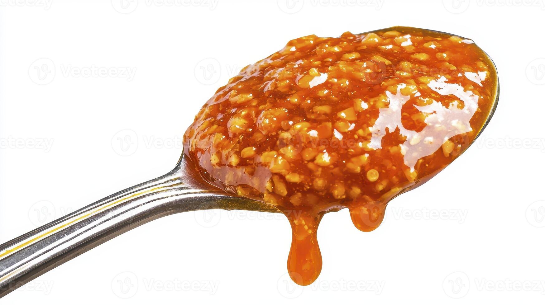 Delicious Spicy Chili Oil Close-Up Discover the fiery flavor of this homemade chili oil, a perfect condiment for enhancing any meal with its rich texture and vibrant red color Explore its uses in photo